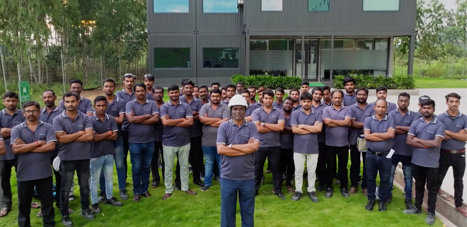 Moduli factory team gathered outside the facility
